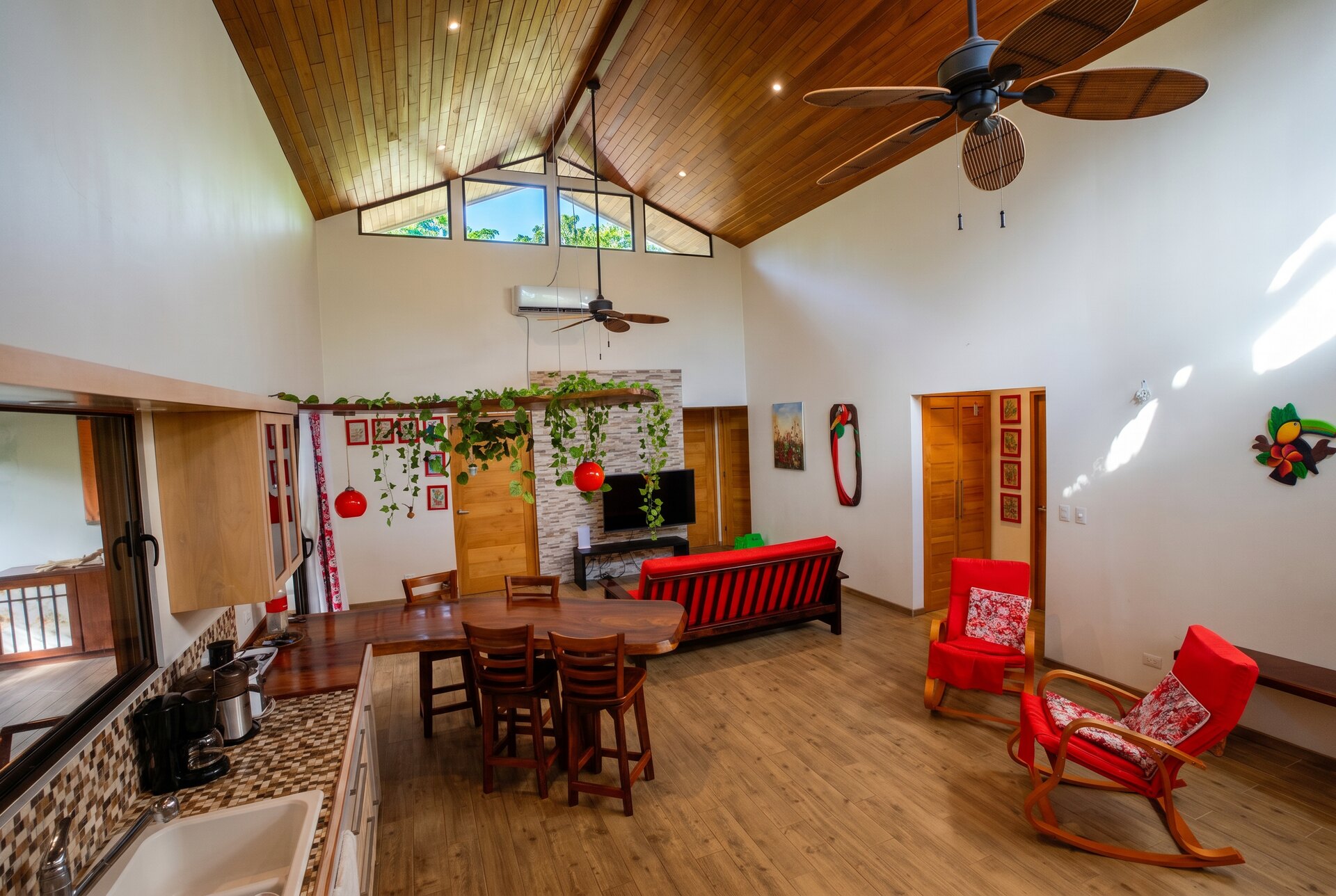 Living room with cathedral wood ceiling